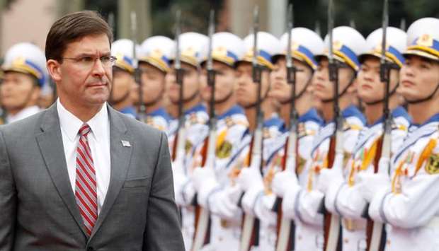 U.S. Defense Secretary Mark Esper reviews the Vietnamese guard of honour during a welcoming ceremony in Hanoi, Vietnam