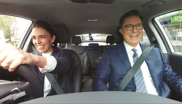 New Zealand PM Jacinda Ardern drives US talk show host Stephen Colbert after picking him up from the airport in Auckland last month.