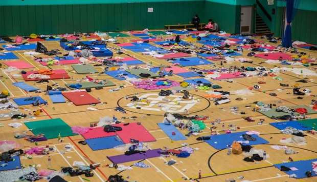 Protesters rest inside a sports hall at Hong Kong Polytechnic University in the Hung Hom district in Hong Kong