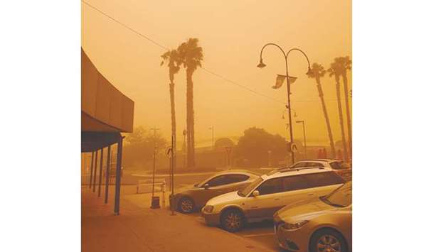 The sky turning orange from dust storms caused by bushfires in Mildura in Victoria state. The fire danger was elevated across wider swathes of southern Australia yesterday, with residents warned to avoid at-risk areas as smoke from bushfires choked Sydney and other major cities.