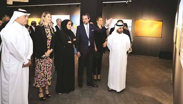 The dignitaries being taken around the Aegean Desert exhibition at Katara yesterday.