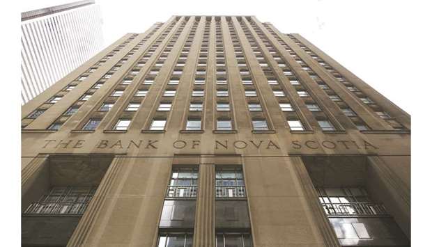 Bank of Nova Scotia signage is displayed outside a branch at Scotia Plaza in Toronto. Scotiabank would consider buying a US money manager that targets affluent customers as part of its effort to get more of its wealth management earnings from outside Canada.