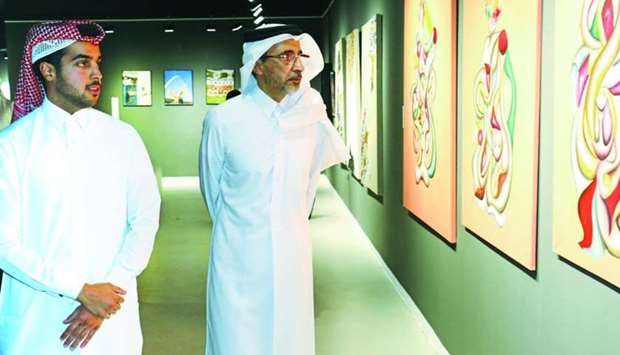 HE the Minister of Culture and Sports Salah bin Ghanem al-Ali and ARC curator Khalifa al-Thani at ARC, Ajyalu2019s interactive multimedia exhibition featuring artworks by 19 of Qataru2019s most promising artists and creative talents.