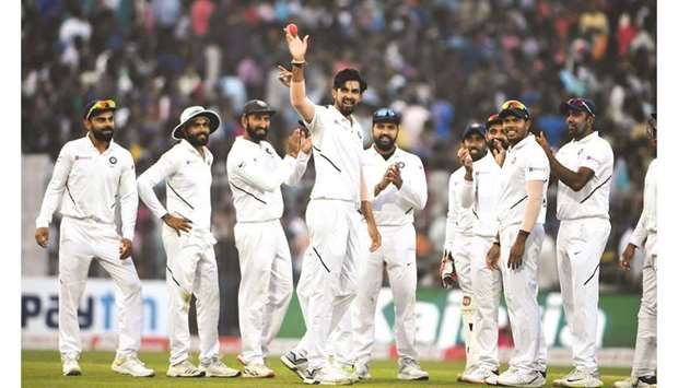 Indiau2019s Ishant Sharma (centre) reacts as his teammates applaud during the first day of the second Test against Bangladesh at The Eden Gardens in Kolkata yesterday. (AFP)