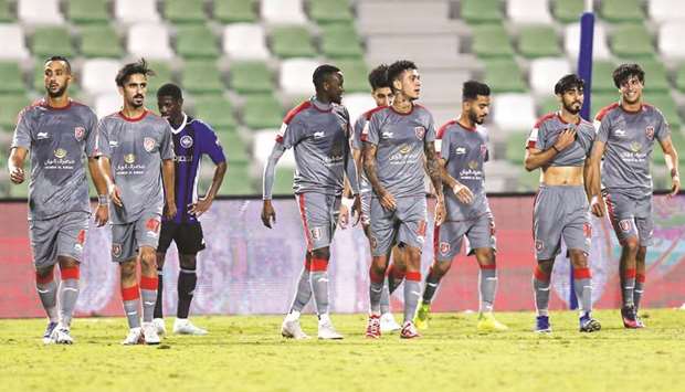 Al Duhailu2019s Edmilson (third left) with teammates after scoring against Al Sailiya during the Ooredoo Cup yesterday.