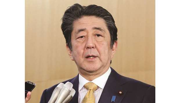 Japanu2019s Prime Minister Shinzo Abe speaks to the media, after South Koreau2019s decision on the military intelligence-sharing agreement, at his official residence in Tokyo yesterday.