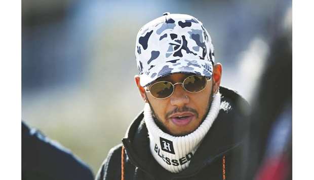 Lewis Hamilton walks in the Paddock before final practice for the F1 Grand Prix of USA at Circuit of The Americas in Austin, Texas, yesterday. (AFP)