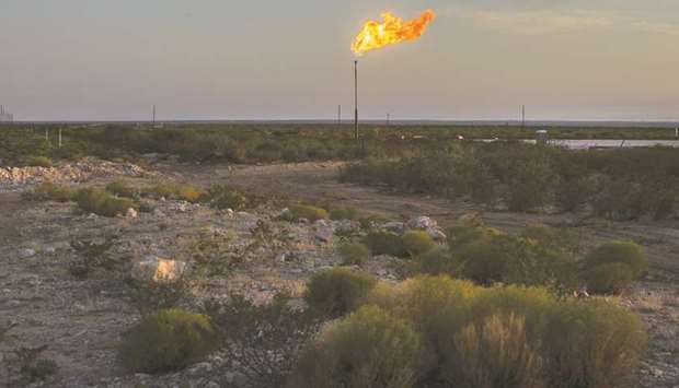 A gas flare burns at dusk in the Permian Basin in Texas (file). Bondholders and other lenders are increasingly wary of whatu2019s unfolding in shale. Chesapeake Energy Corp, once the nationu2019s largest gas supplier, warned earlier this month it may struggle to avoid bankruptcy. While fracking has turbocharged US oil and gas output in recent years, that success has helped drive down oil prices to almost half what they were five years ago.