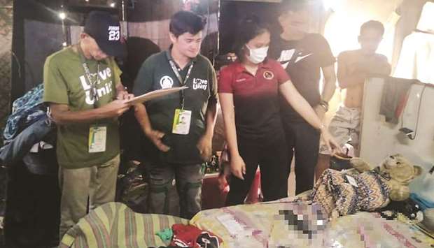 Philippines authorities in the Rizal house where a woman was arrested for allegedly exploiting her own daughter.