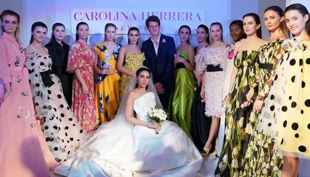 STATEMENT: Wes Gordon, the Creative Director of Carolina Herrera, takes a bow with models in Herrerau2019s Spring/Summer 2020 Ready-to-Wear and Bridal collection.