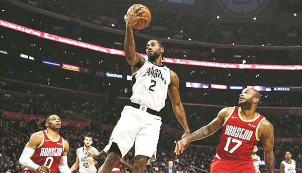 Los Angeles Clippers Clippers forward Kawhi Leonard grabs a rebound between Houston Rockets guard Russell Westbrook (left) and Houston Rockets forward PJ Tucker during the second quarter at Staples Center. PICTURE: USA TODAY Sports