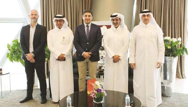 Qatar Football Association President Sheikh Hamad bin Khalifa bin Ahmed al-Thani (second right) with Greek Deputy Minister of Culture and Sports Lefteris Avgenakis (centre) and other officials.