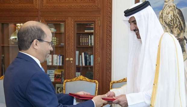 His Highness the Amir Sheikh Tamim bin Hamad al-Thani received at the Amiri Diwan office Sunday the credentials of Tunisia's new ambassador to Qatar, Sami al-Saidi. The Amir welcomed the ambassador, wishing him success in his missions and the relations between Qatar and Tunisia further progress and prosperity. For his part, the ambassador conveyed to the Amir greetings of his countrie's leader and wishes of further progress and prosperity to the Qatari people. The ambassadors was accorded an official reception ceremony at the Amiri Diwan.