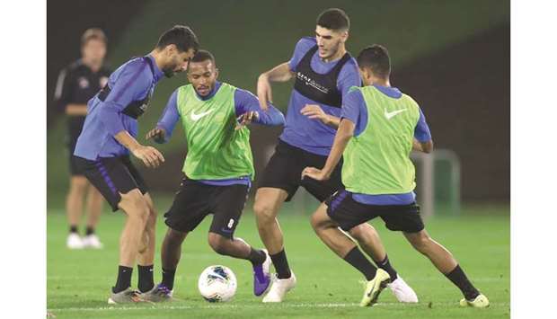 Qatar players take part in a training session on the eve of the 24th Arabian Gulf Cup tournament opener against Iraq in Doha. PICTURES: Fadi al-Assaad