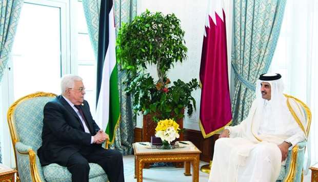 His Highness the Amir Sheikh Tamim bin Hamad al-Thani meets with Palestinian President Mahmoud Abbas
