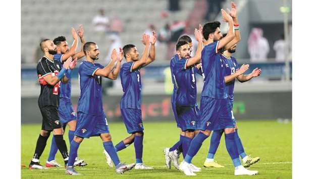 Kuwait players celebrate their win over Saudi Arabia in their Arabian Gulf Cup match at Abdullah Bin Khalifa Stadium Wednesday. PICTURE: Anas Khalid