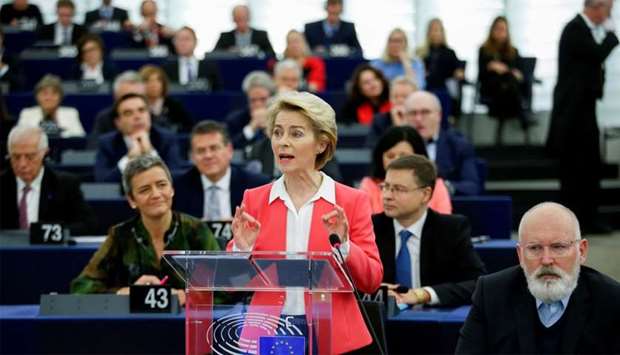 European Commission President-elect Ursula von der Leyen addresses the European Parliament next to European Commission vice-president Frans Timmermans ahead of a vote of Members of the European Parliament on her college of commissioners, in Strasbourg, France