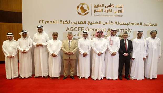 Arab Gulf Cup Football Federation (AGCFF) president Sheikh Hamad bin al-Thani (centre) poses with vice-president Dr Jassim bin Mohamed al-Shukaili (second left), Secretary General Jassim al-Rumaihi (left) and representatives of the member associations after the General Assembly of AGCFF on Thursday. PICTURE: Jayaram.