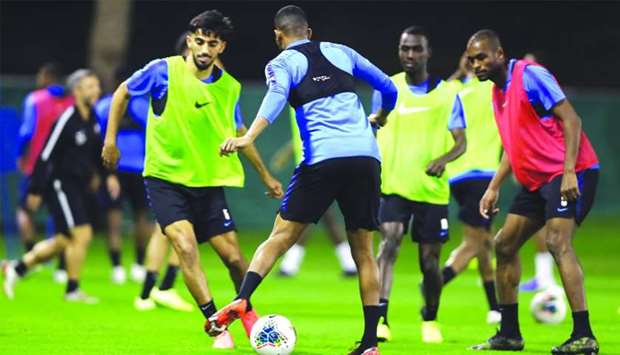 The Qatar team during their training session in Doha on Thursday