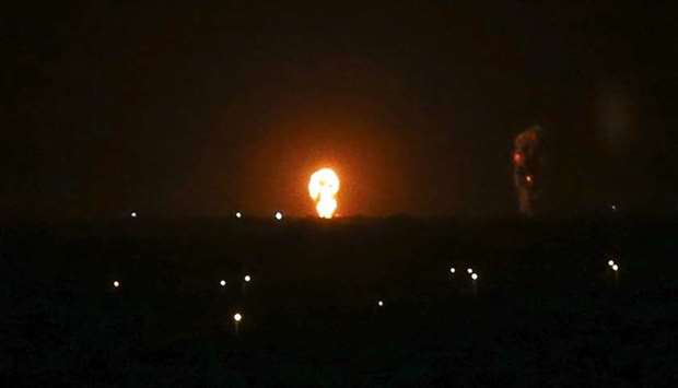 A ball of fire is seen following an Israel airstrike in Khan Yunis in the southern Gaza Strip early on Wednesday