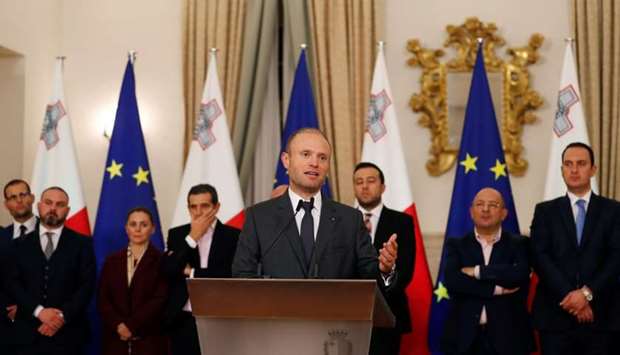 Maltese Prime Minister Joseph Muscat addresses a press conference after an urgent Cabinet meeting at the Auberge de Castille in Valletta, Malta