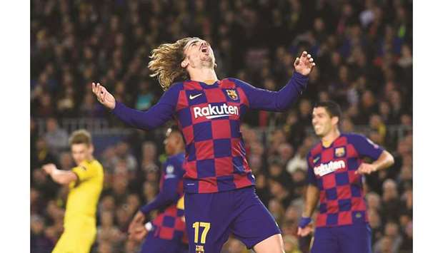 Barcelona forward Antoine Griezmann reacts after a goal during the UEFA Champions League Group F match against Borussia Dortmund in Barcelona, Spain, on Wednesday. (AFP)