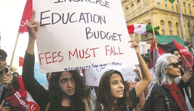 Protesters take part in a demonstration in Karachi to demand the reinstatement of student unions, education fee cuts, and better education facilities.