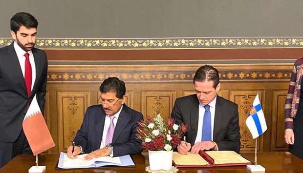 HE the Secretary General of the Ministry of Foreign Affairs Dr. Ahmed bin Hassan Al Hammadi and Finland's Undersecretary of the Ministry of Foreign Affairs for Foreign and Security Policy Carrie Jurgen sign the MoU