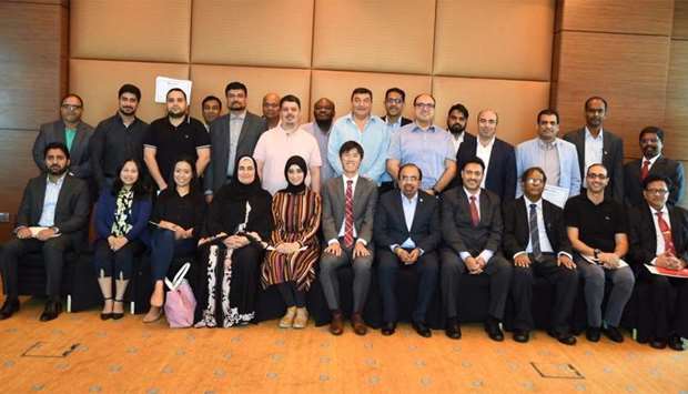 Renowned trainer, Kwong Yue Yang is flanked by members and officials of the IIA Doha Chapter during the one-day communication workshop.