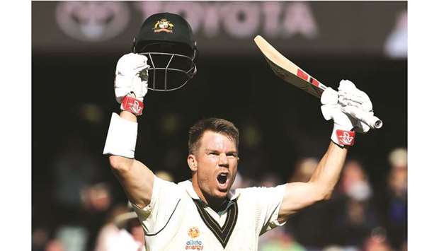 Australiau2019s David Warner celebrates reaching his triple century during the day two of the second Test match against Pakistan in Adelaide yesterday. (AFP)