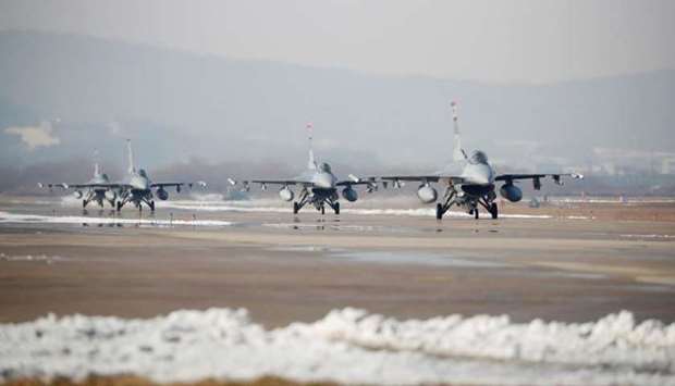 US Air Force F-16 fighter jets take part in a joint aerial drill exercise called 'Vigilant Ace' between US and South Korea, at the Osan Air Base in Pyeongtaek, South Korea, December 6, 2017