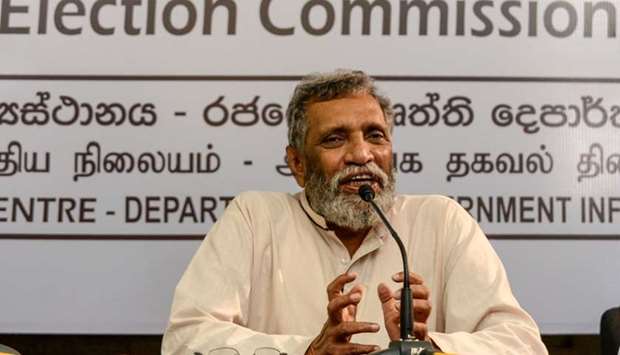 Sri Lanka's Election Commission Chairman Mahinda Deshapriya speaks during a press conference in Colombo on October 31
