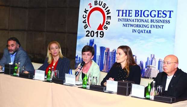 Italian embassy deputy head of mission Carlotta Colli delivering a speech at the 'Back 2 Business' press conference held in Doha yesterday. Looking on are (from left) Turkish Businessmen Association vice president Yigit Yeltepe, Italian Chamber of Commerce Qatar chairperson Palma Libotte, German Industry and Commerce Office Qatar (AHK) representative Kathrin Lemke and American Chamber of Commerce second vice chairman Jay Turk. PICTURE: Jayan Orma