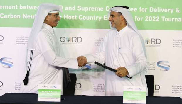 Hilal al-Kuwari and Dr Yousef Mohamed AlHorr after signing the agreement.rnrn
