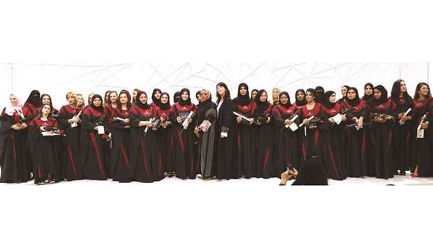 Tajmeel graduates in a group photo.