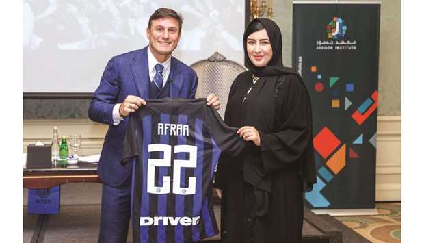 Afraa al-Noaimi, Executive Director of Josoor Institute with Javier Zanetti, Vice President at FC Internazionale Milan.