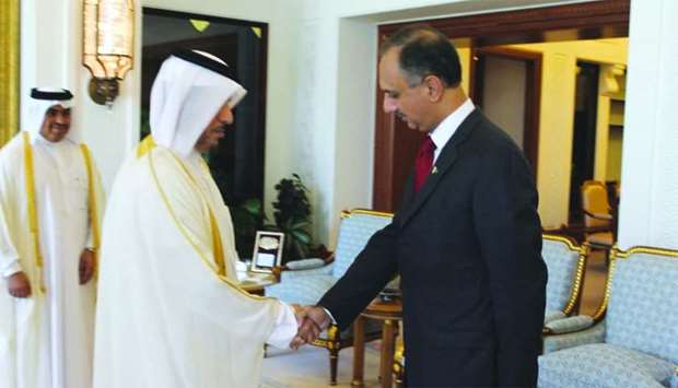 Khan meets with HE the Prime Minister and Minister of Interior Sheikh Abdullah bin Nasser bin Khalifa al-Thani in the presence of HE al-Kuwari.