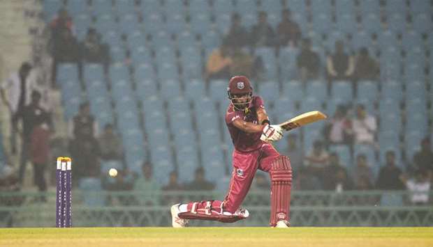 West Indiesu2019 Roston Chase plays a shot during the first ODI against Afghanistan in Lucknow. (AFP)