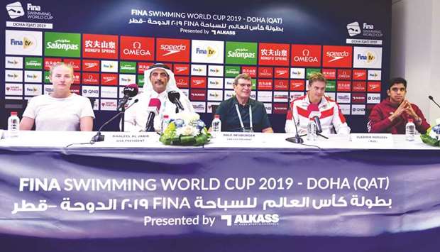 Qatar Swimming Association president and FINA Bureau Member Khaleel al-Jabir (second left), FINA Vice President Dale Neuburger (centre), swimmers Vladimir Morozov (second right), Michelle Coleman (left) and Abdulaziz al-Obaidly at a press conference at the Hamad Aquatic Centre yesterday. PICTURE: Noushad Thekkayil