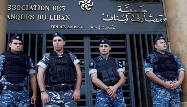 Lebanese police stand outside the entrance of the Association of Banks in downtown Beirut, Lebanon on November 1.