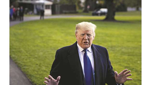 US President Donald Trump speaks to members of the media on the South Lawn of the White House in Washington, DC, yesterday. u201cChina would like to get somewhat of a rollback (of tariffs) u2014 not a complete rollback, because they know I wonu2019t do it,u201d Trump said yesterday.