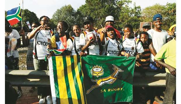 Girls from the Soweto Rugby School Academy at the World Cup-winning South  African teamu2019s parade at the Hector Pieterson Museum in Soweto. (AFP)