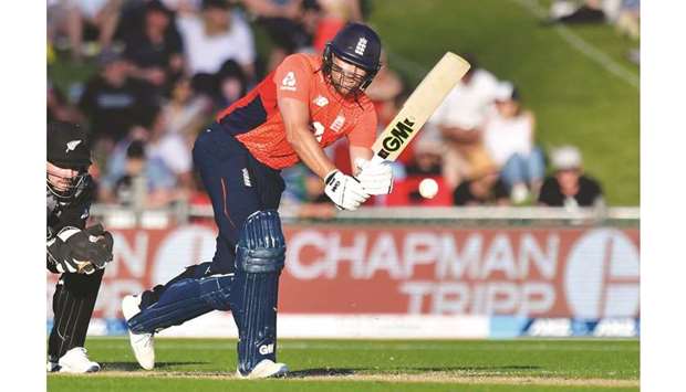 Englandu2019s Dawid Malan plays a shot en route to an unbeaten 103  during the T20 match against New Zealand in Napier. (AFP)