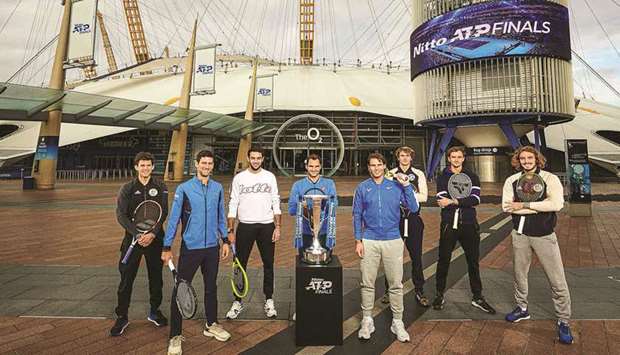 Players pose at the Londonu2019s iconic O2 arena yesterday on the eve of the ATP Finals.