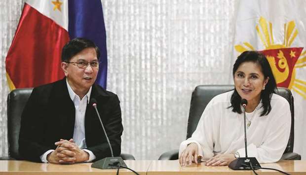 Philippine Drug Enforcement Agency Director General Aaron Aquino and Philippines Vice President Maria Leonor Robredo answer questions from the media after a closed-door meeting in Quezon City, Metro Manila, yesterday.