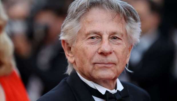 In this file photo taken on May 23, 2017 French-Polish director Roman Polanski poses as he arrives for the '70th Anniversary' ceremony of the Cannes Film Festival in Cannes, southern France.