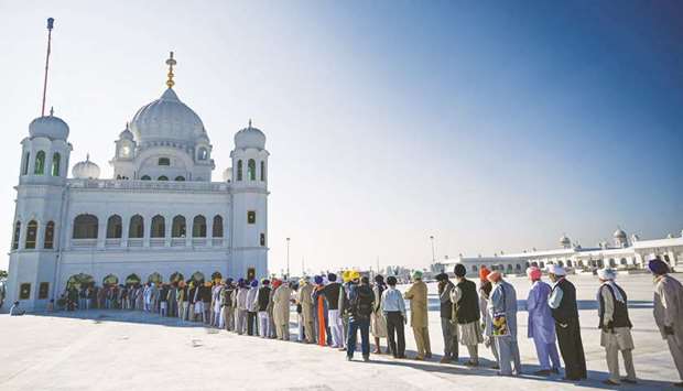 This picture taken on November 9 last year shows Sikh pilgrims queuing to visit the Shrine of Baba Guru Nanak Dev at Gurdwara Darbar Sahib, Kartarpur.