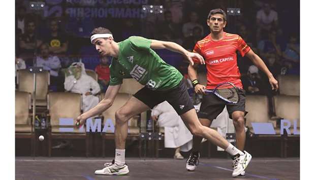 File photo of Ali Farag (left) of Egypt in action against Saurav Ghoshal of India during their Qatar Classic match on October 31, 2018.