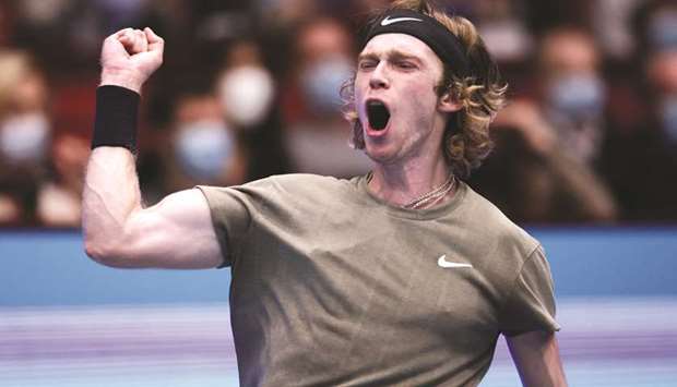 Russiau2019s Andrey Rublev celebrates winning the Vienna Open final against Italyu2019s Lorenzo Sonego in Vienna yesterday. (Reuters)