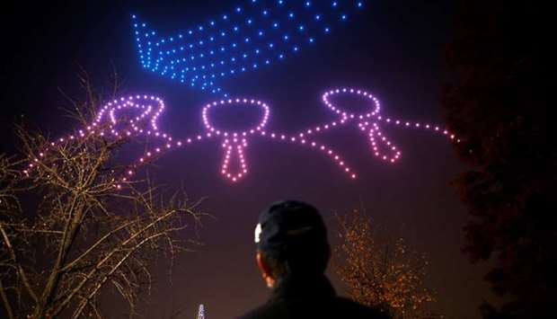 Drones fly in formation showing messages of hope amid the coronavirus disease outbreak in Seoul, South Korea.